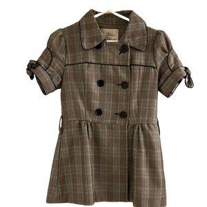 Women’s plaid jacket with cute sleeve details and  double breasted buttons.